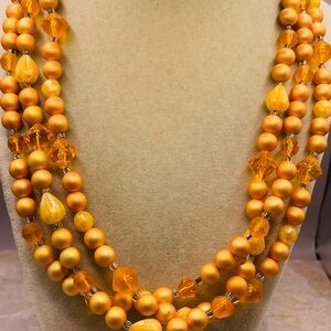 Vintage Orange and Yellow Acrylic Beaded 3 Strand Necklace. 20 inches